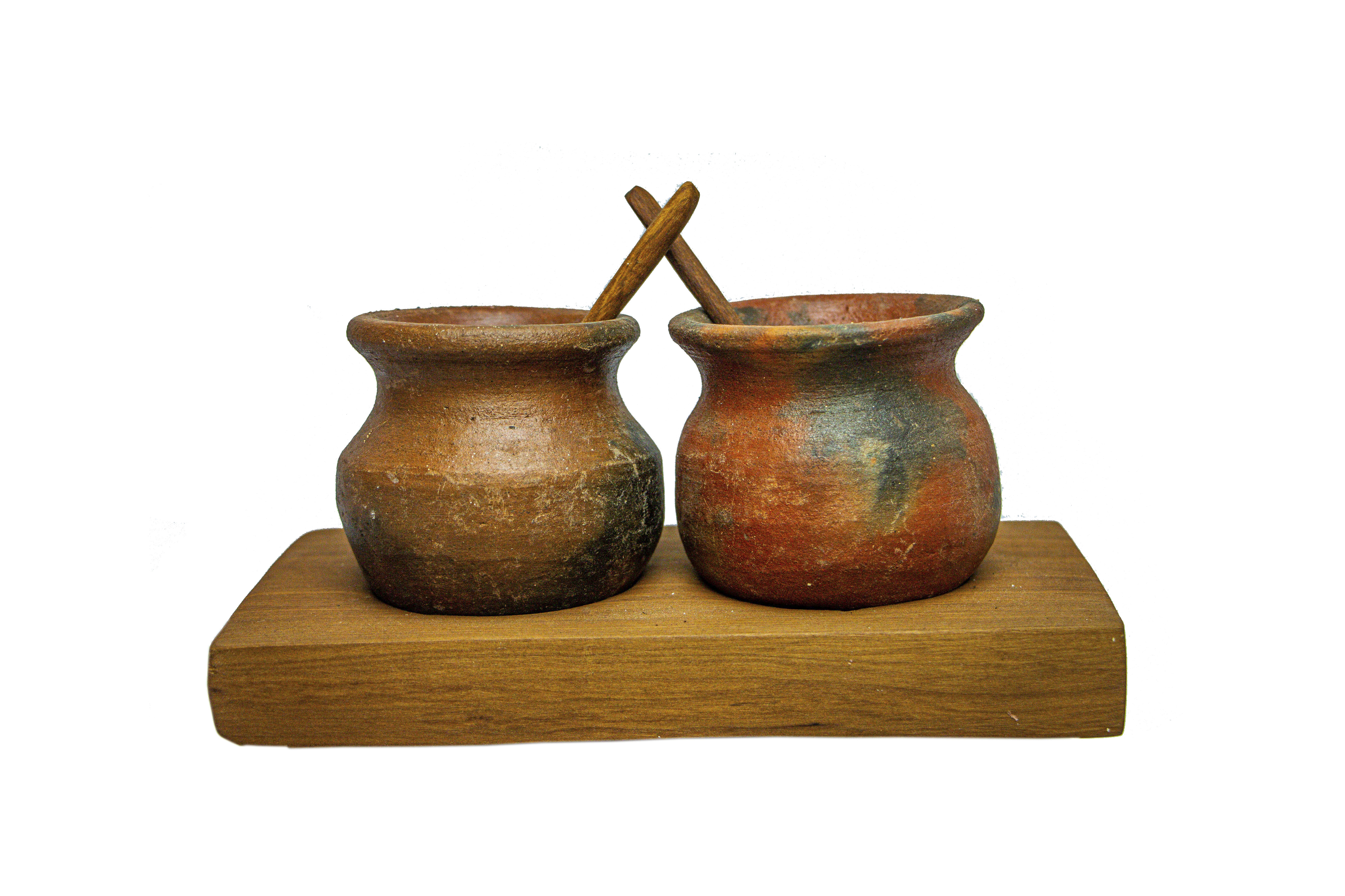 Claypot with Spoon on a Wooden Stand